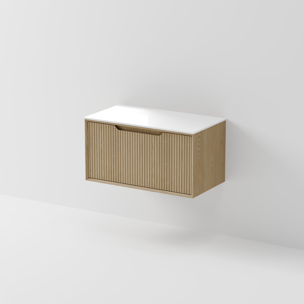 Aria 900 wall hung vanity with grooved drawer front and Villastone slab top
