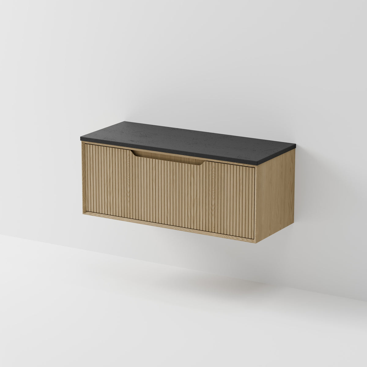 Aria 1200 wall hung vanity with vertical grooved drawer and concrete slab top