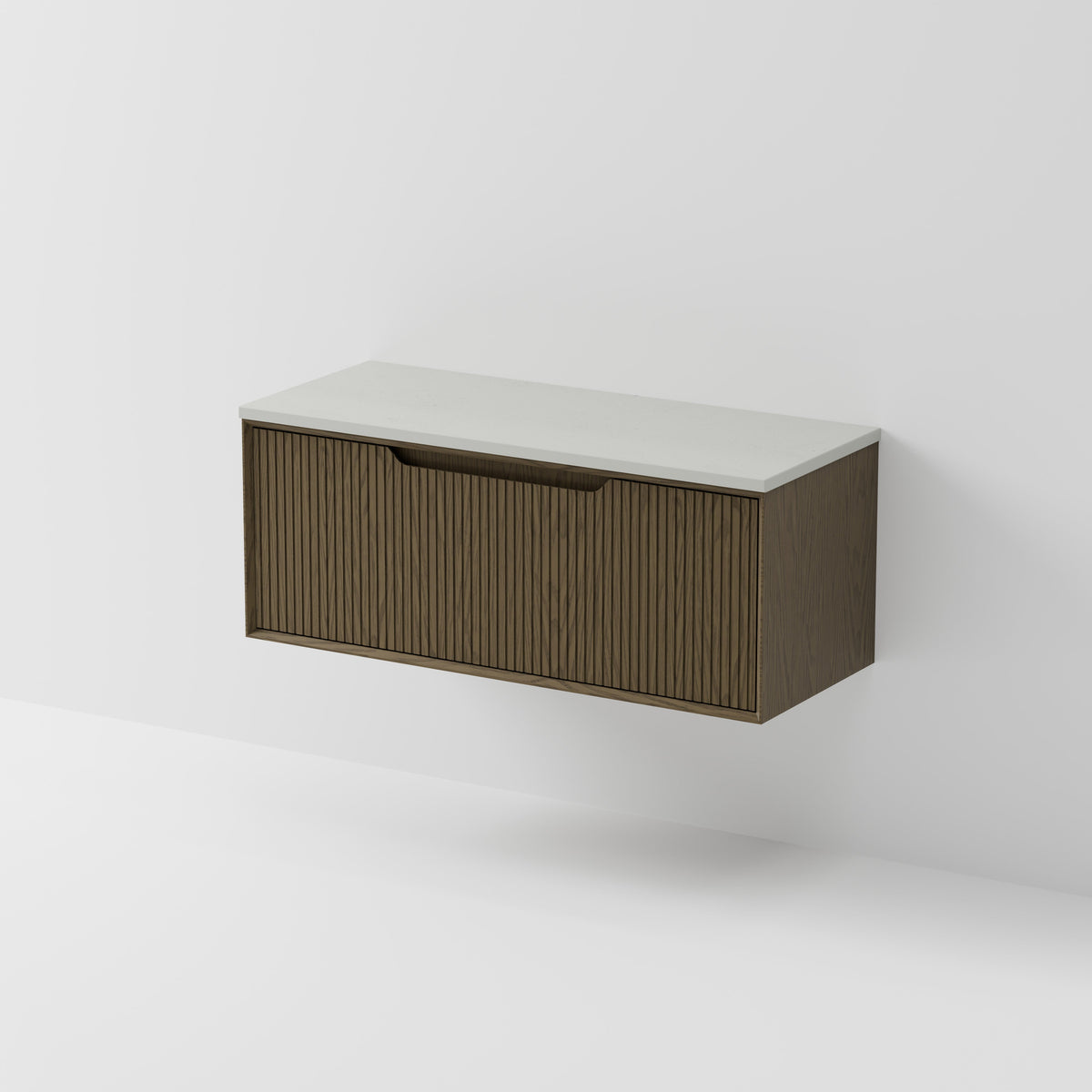 Aria 1200 wall hung vanity with vertical grooved drawer and concrete slab top
