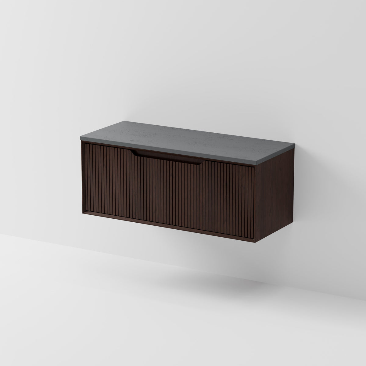 Aria 1200 wall hung vanity with vertical grooved drawer and concrete slab top