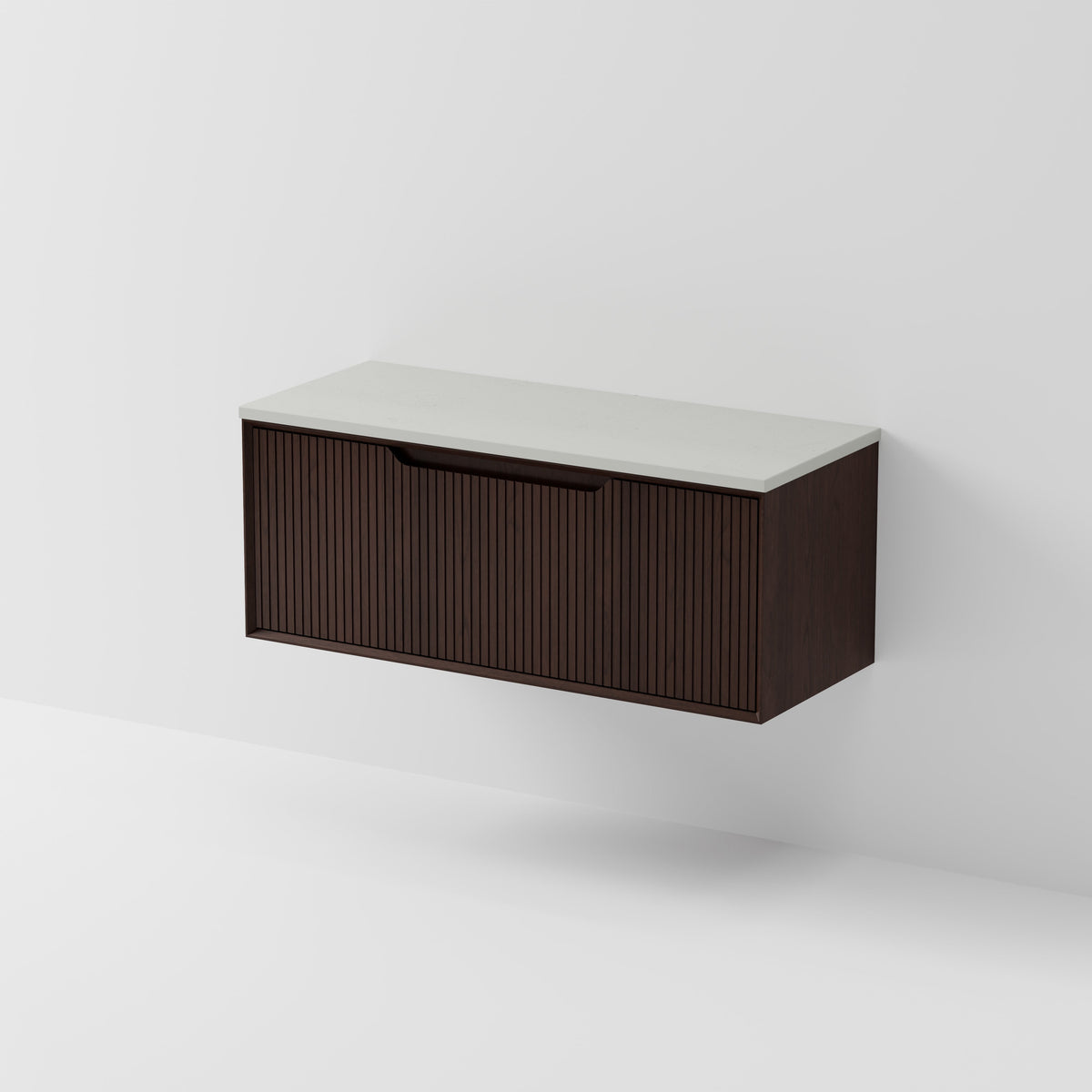 Aria 1200 wall hung vanity with vertical grooved drawer and concrete slab top