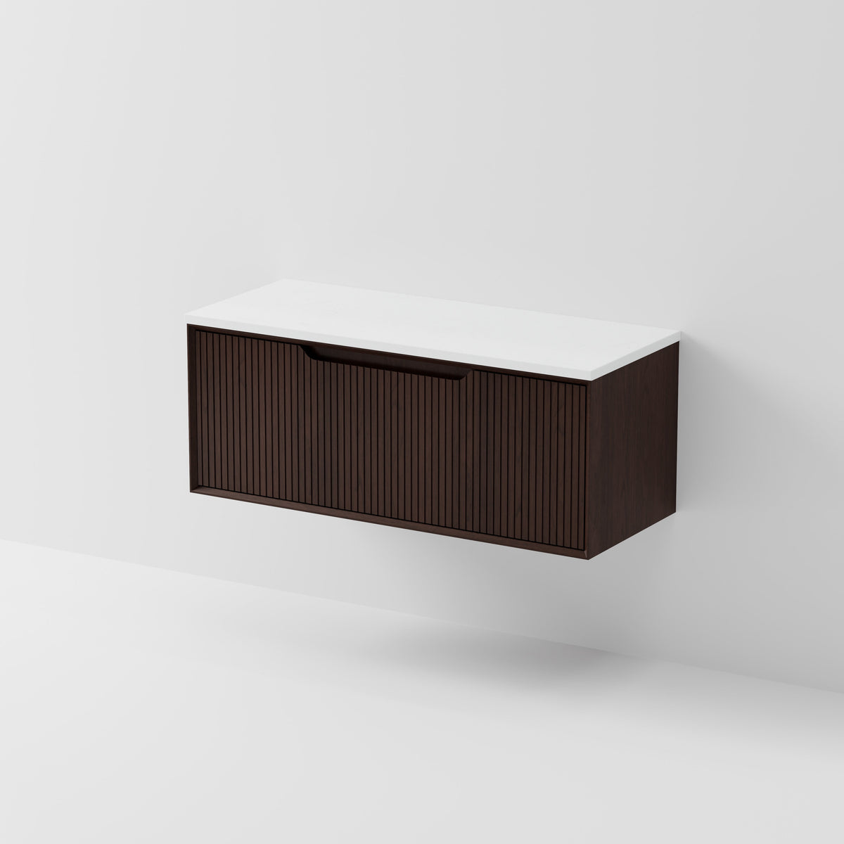 Aria 1200 wall hung vanity with vertical grooved drawer and concrete slab top