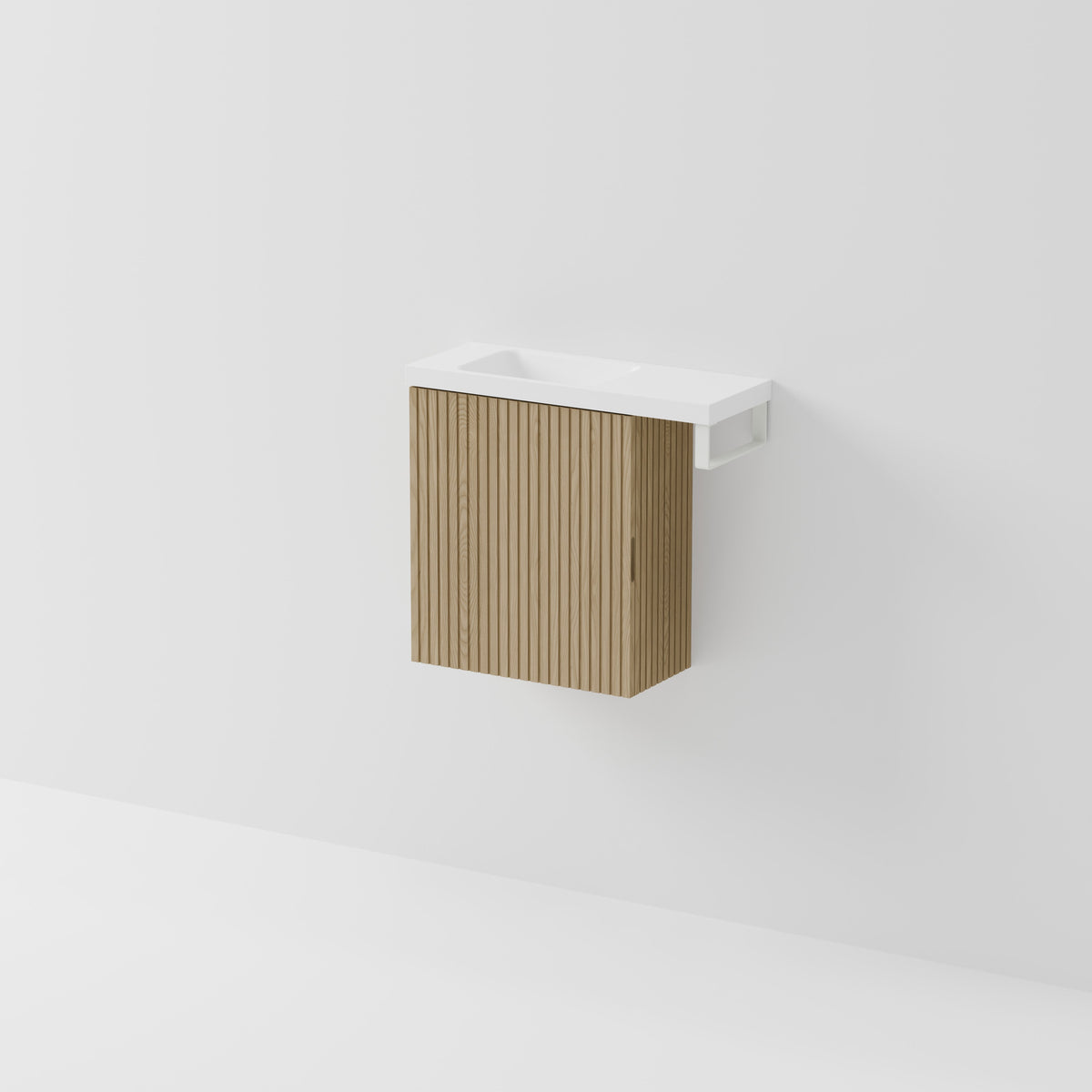 Aria 450 compact WC vanity with offset 600 basin and integrated towel rail