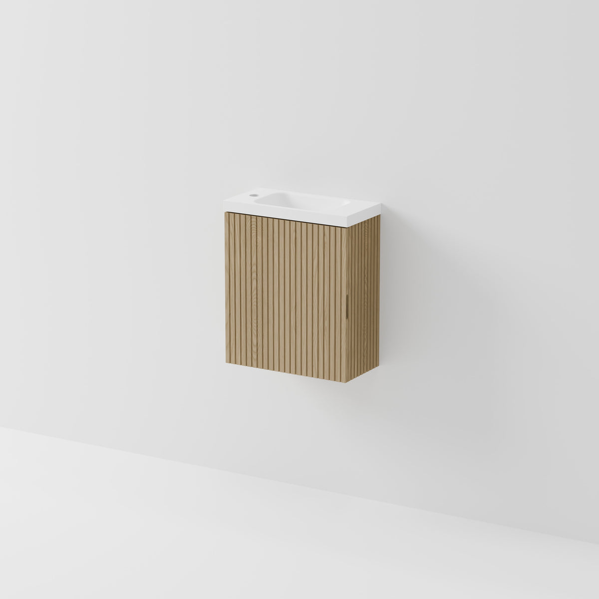 Aria 450 compact WC wall hung vanity with grooved ash door and white basin