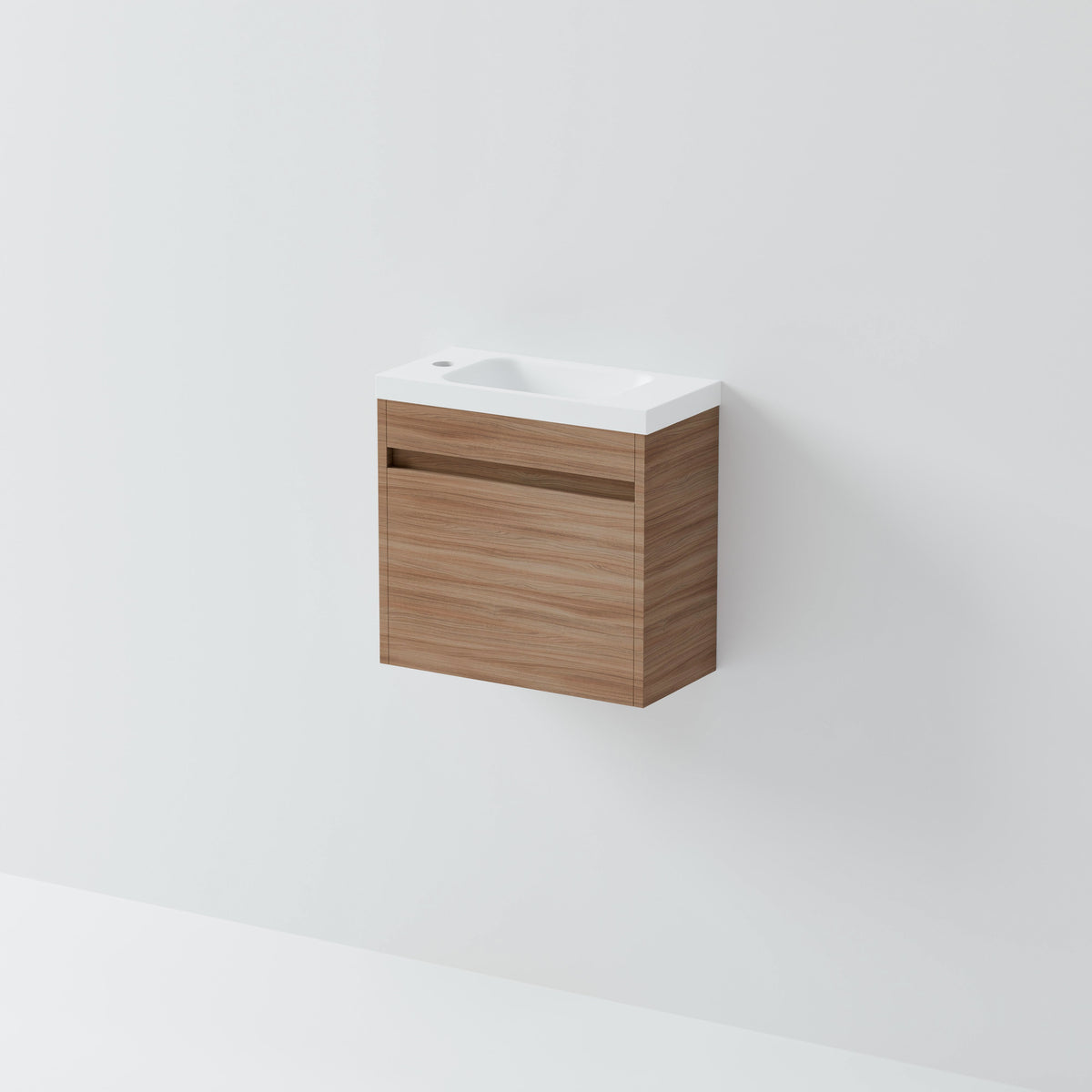 Luxe 450 compact WC wall hung vanity with integrated white basin top