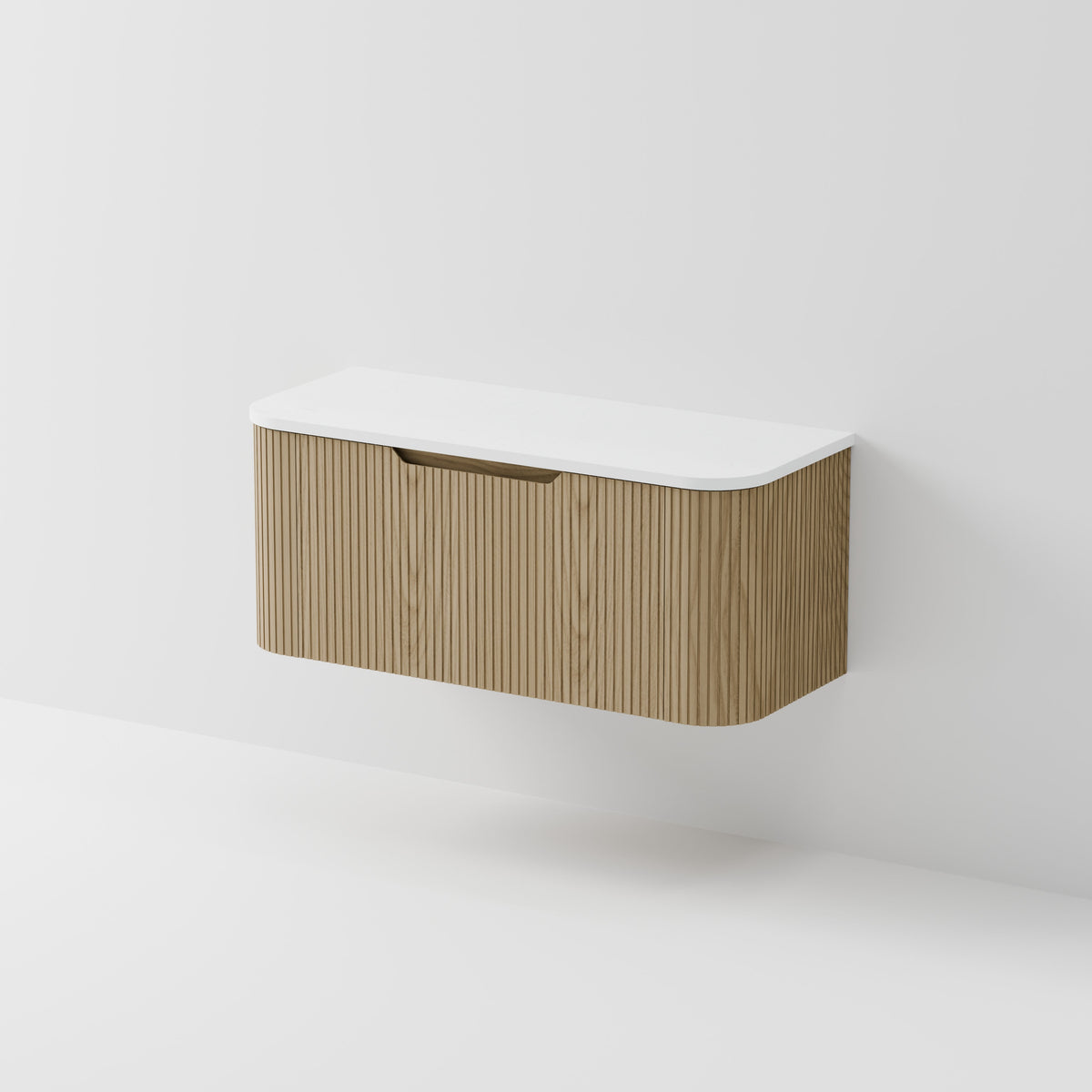 Sora 1200 wall hung vanity in ash with curved grooved drawers and concrete top