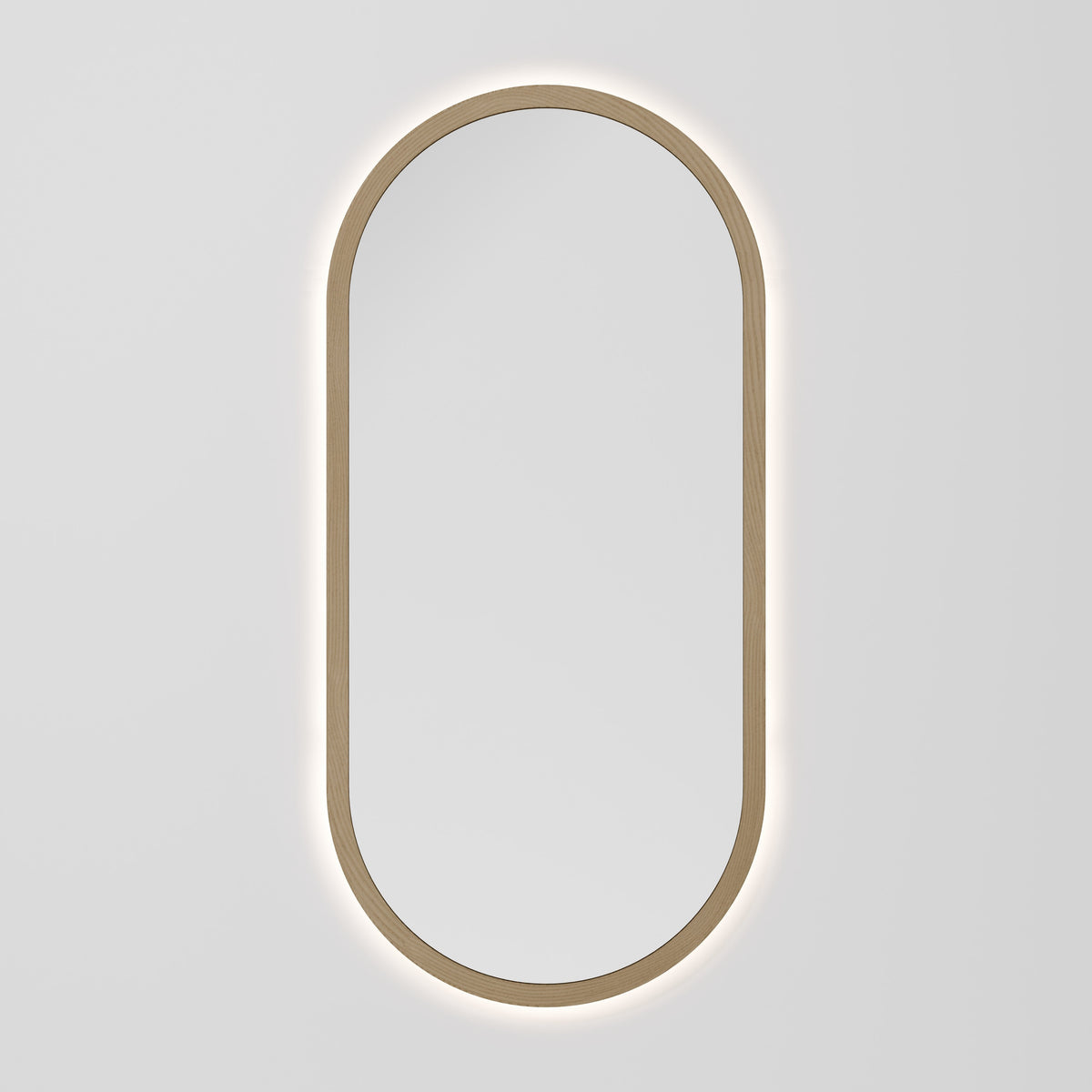 Sora 500x1050mm oval LED mirror with solid ash timber frame and warm back-lighting